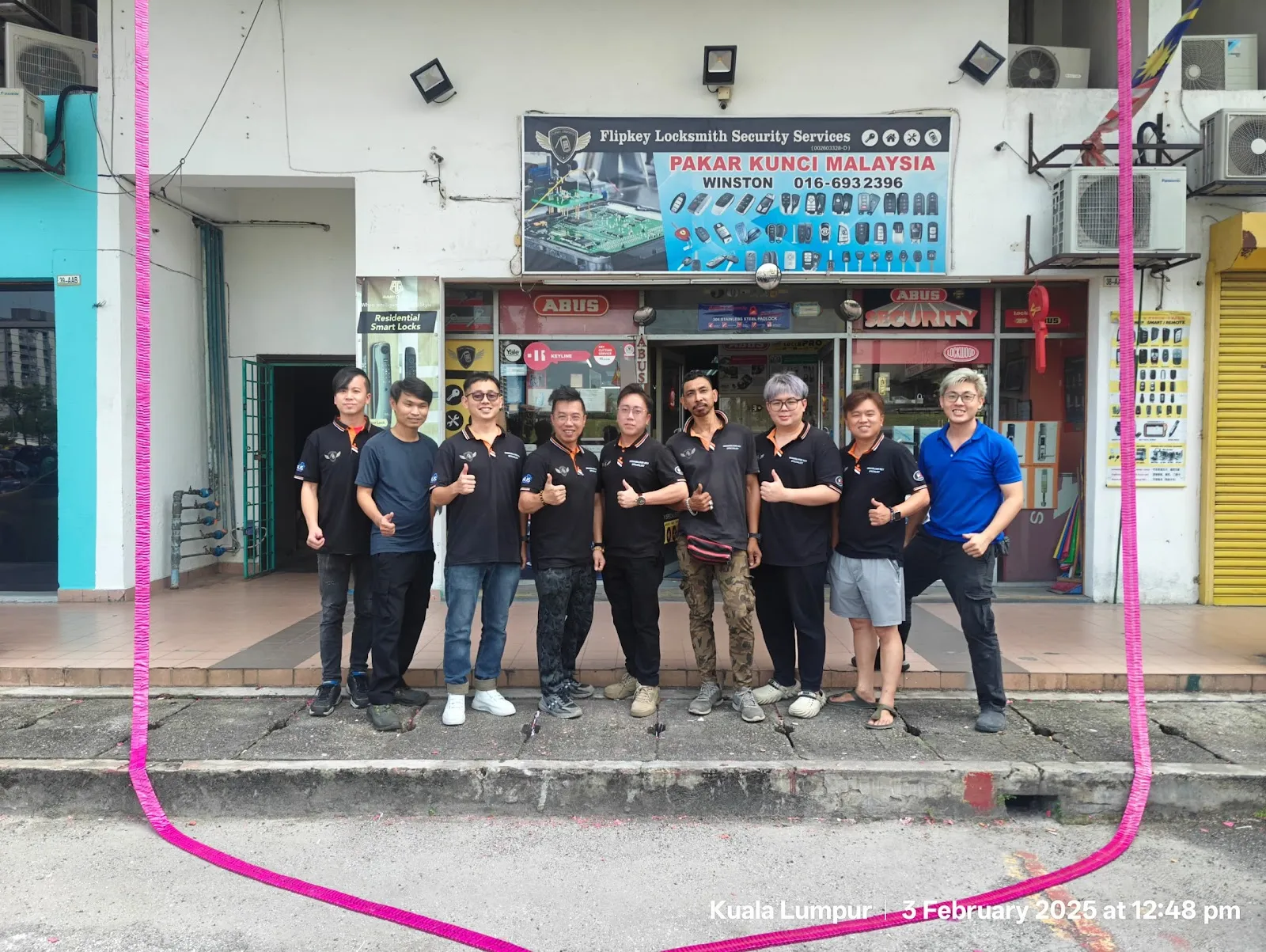 Flipkey team in front of the shop